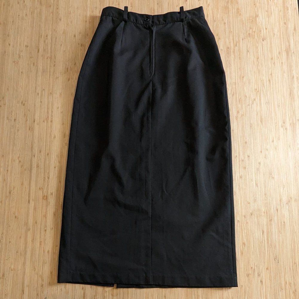 Taboo International Skirt with mild slit Black in color size 9 with belt loops